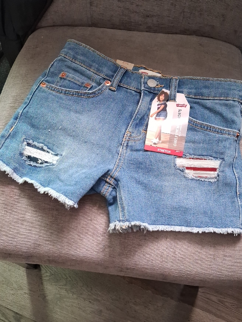 Levi's Light Blue Distressed Denim Cutoff Shorts with Flag Details